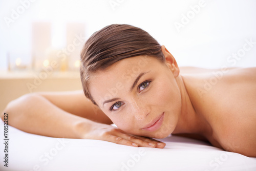 Relax, portrait and woman at natural spa with body massage for health, wellness and self care. Happy, smile and female person with calm, peaceful and serene skin therapy treatment at beauty salon.
