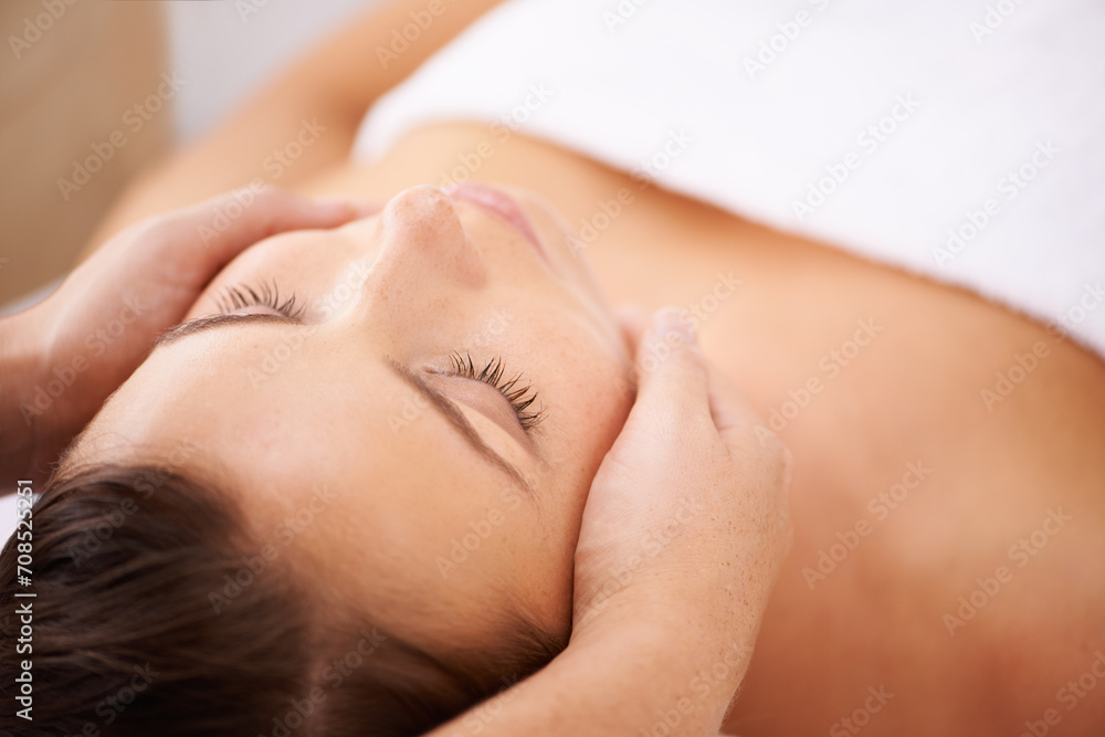 Space, woman and face massage for skincare, holistic therapy or healthy healing at cosmetics salon. Calm client relax at wellness resort for facial reiki, acupressure or peaceful treatment for beauty