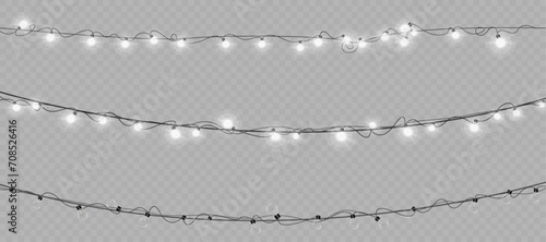 Christmas glowing garlands. Christmas lights isolated on transparent background. For congratulations, invitations and holiday design.	 photo