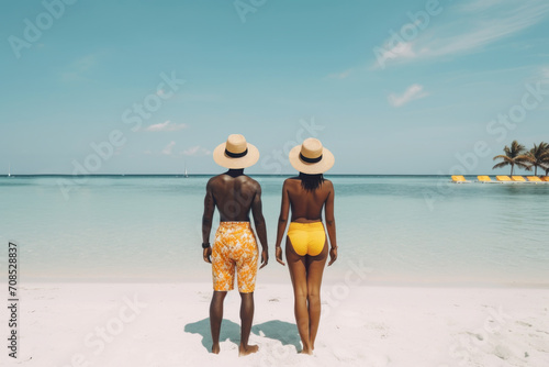 Middle-aged African couple on the background of tropical resort