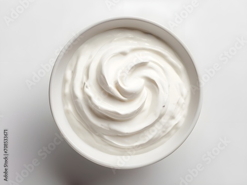 Top view of isolated bowl of sour cream