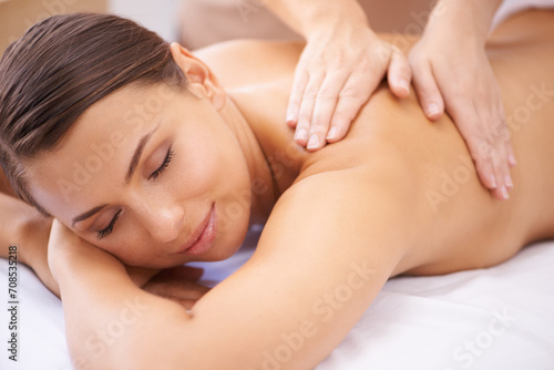 Woman, hands and back massage at spa, healing and aromatherapy with wellness and masseuse. Calm, natural and beauty with skincare, body care and health, holistic treatment for zen or stress relief