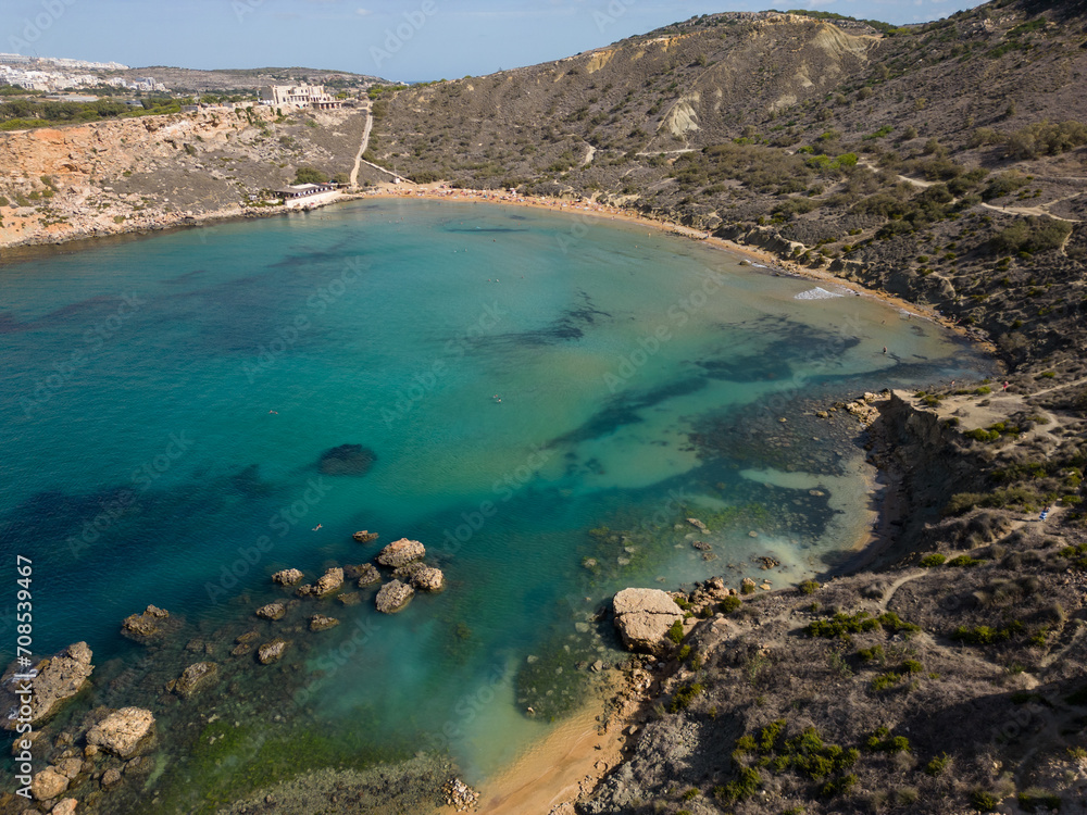 Obraz premium Ghajn Tuffieha Bay Malta Riviera beach aerial with beautiful rock formation in turquoise sea
