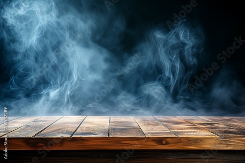 empty wooden table with smoke float up on dark background