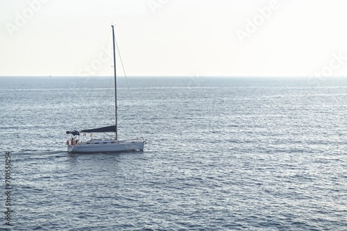 Tourist on the Sailboat serenely explore the beautiful Mediterranean Sea.