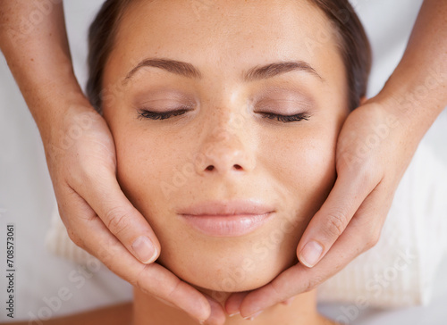 Woman, face or massage at spa from above for beauty, skincare treatment or healing at cosmetics salon. Happy client relax at wellness resort for reiki, facial acupressure or peaceful holistic therapy