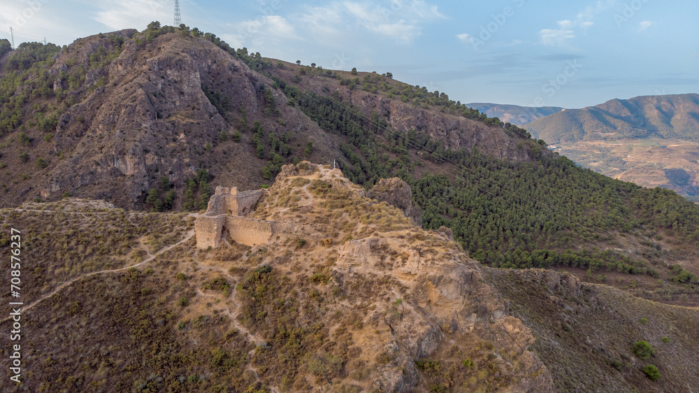 An aerial view of the historic Castle ruins of Mondujar Spain