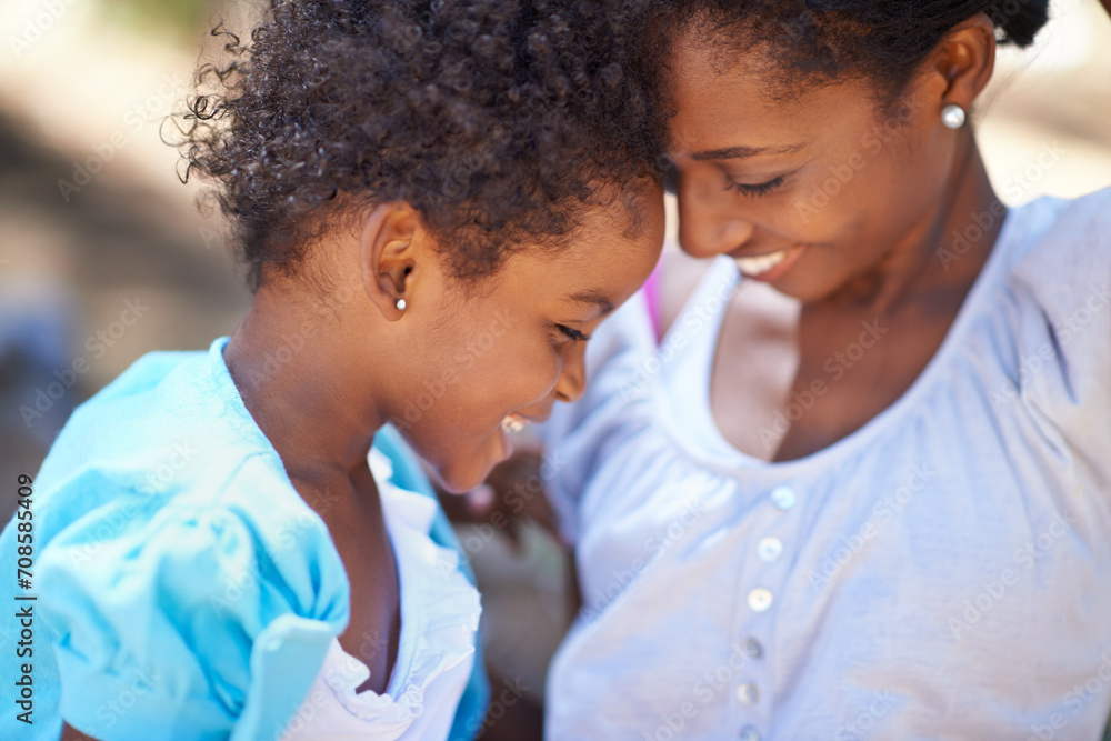 Daughter, love or mother in nature or forest to relax, care or bond on a summer holiday vacation. Kid, forehead or happy African mom in park or woods on outdoor adventure with support or black family Daughter, love or mother in nature or forest to relax, care or bond on a summer holiday vacation. Kid, forehead or happy African mom in park or woods on outdoor adventure with support or black family