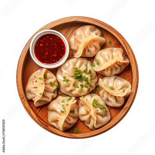 Dumpling momos with sauce in a wooden plate isolated on transparent background Remove png, Clipping Path, pen tool