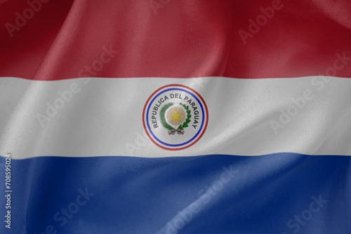 Paraguay waving flag close up fabric texture background