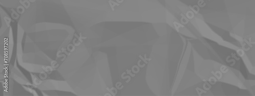 Black paper texture background. Black crumpled paper texture in low light background