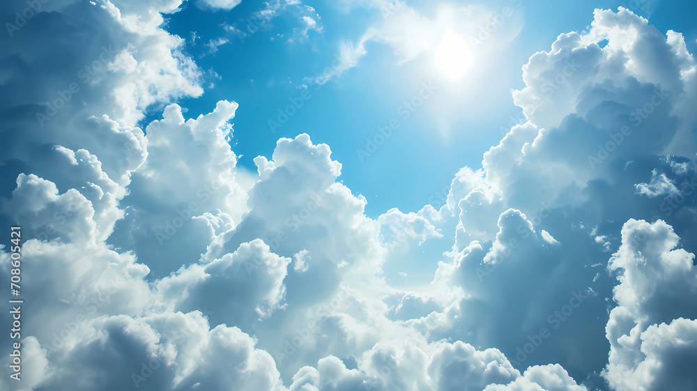 Angelic light white fluffy clouds with a blue sky background Angelic light white fluffy clouds with a blue sky background
