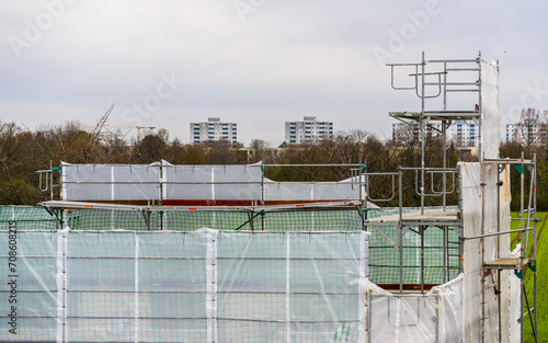  Metal scaffolding on cityscape background