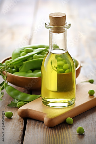 pea essential oil close-up on a wooden table photo