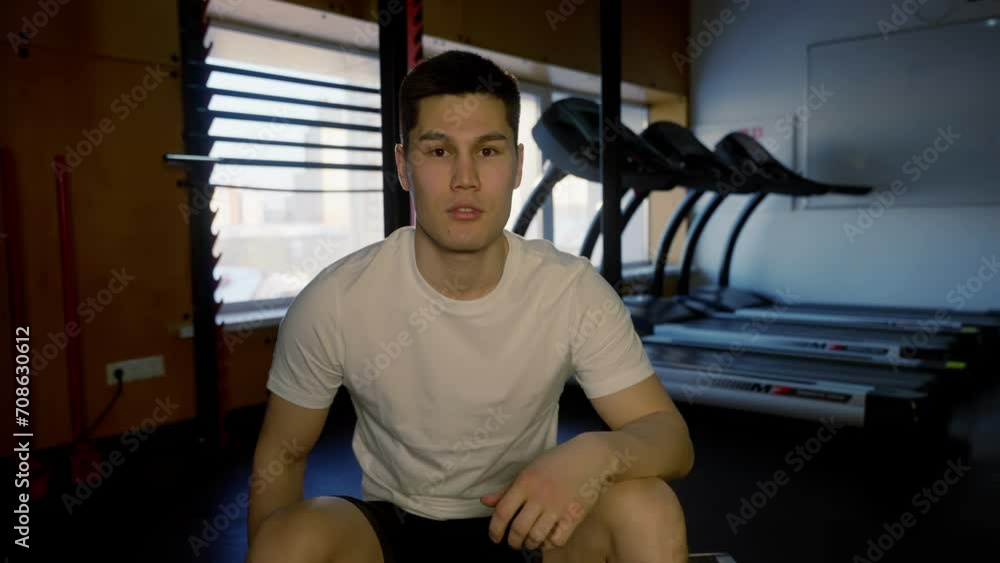 Focused Man Resting at Gym After Workout Focused Man Resting at Gym After Workout