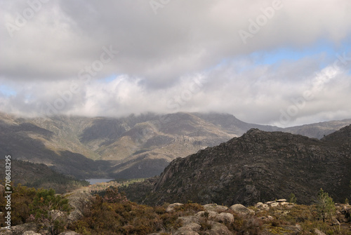 Mountains landscape with small lake and cloudy sky, Gerês mountain in Portugal