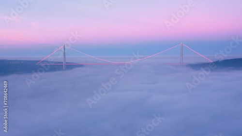 Istanbul Bosphorus Sea covered with dense fog, was closed to traffic from morning to sunset on both directions. YSS Bridge is visible with only red lights