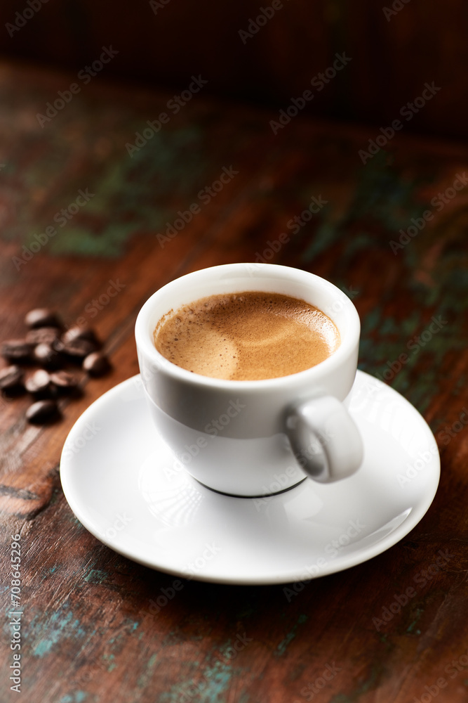 Cup of coffee on wooden background. Close up. Cup of coffee on wooden background. Close up.