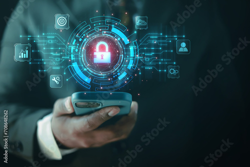 cybersecurity concept Business man shows how to protect cyber technology network from attack by hackers on the internet. Secure access to privacy through smartphones Meta protection. 
