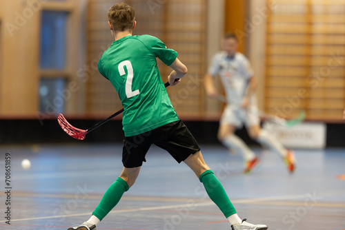 Obraz na płótnie Floorball players playing in a floorball championship game