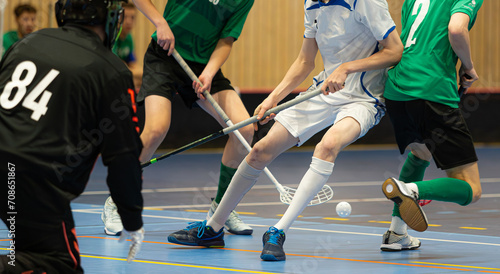 Floorball players playing in a floorball championship game