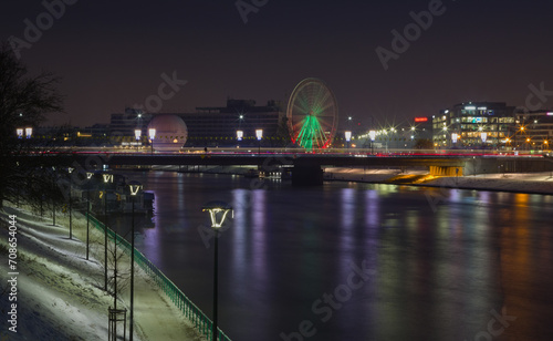 night view of the bridge and ferris wheel