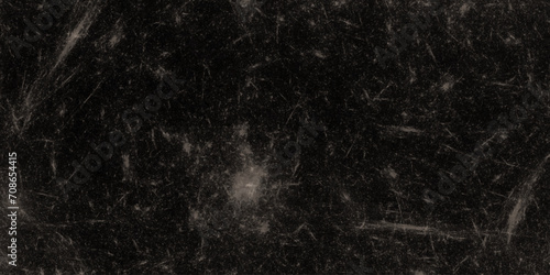 Black grunge background with dust and scratches, can be used as background pattern. abstract black dark background, broken cracks and scratches for overlay