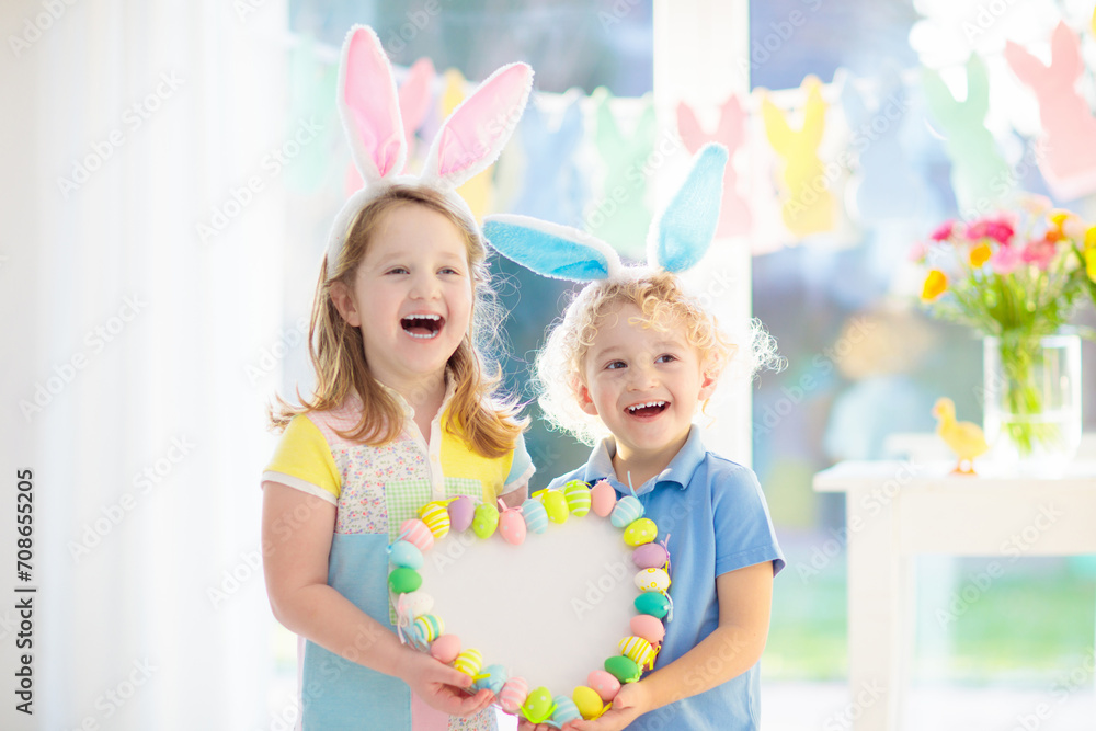 Kids on Easter egg hunt. Children dye eggs. Kids on Easter egg hunt. Children dye eggs.