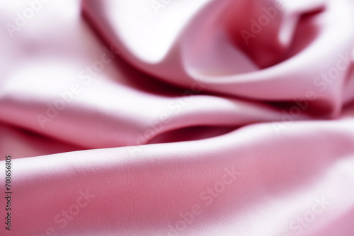 Textured Satin Duchess pink plush draping fabric. Elegant and elegant background. Space for web banner design templates. Close-up, blurred or blurred  photo