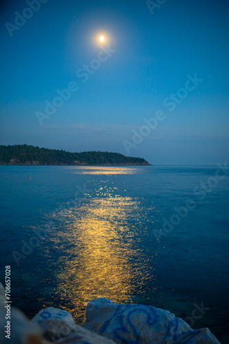 Yellow Golden Moon With Rocks at Mediterranean Sea in Thassos, Greece