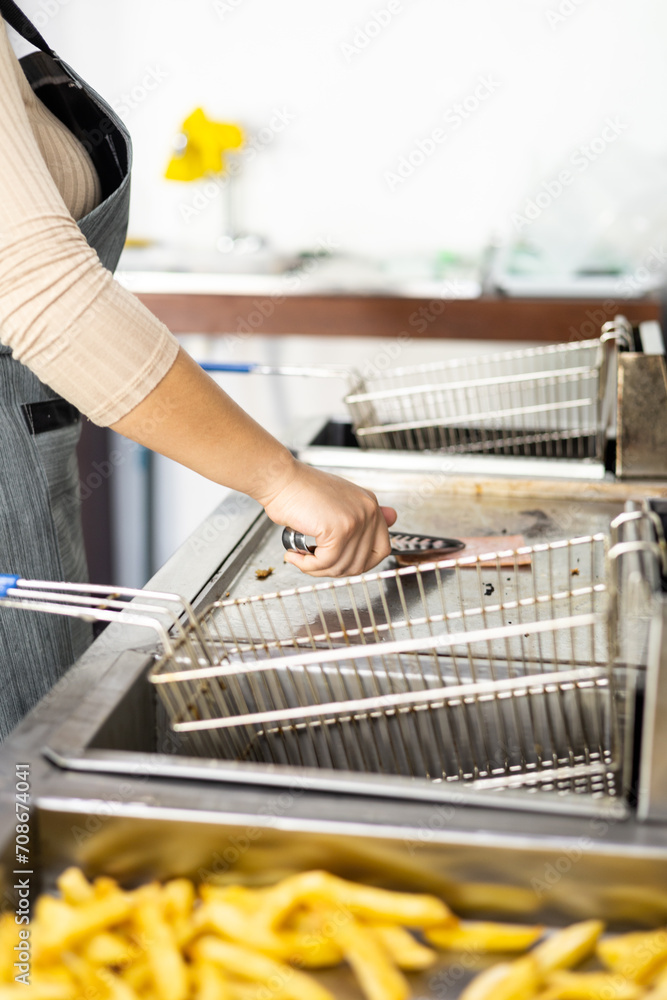 cooking meat on a grill, fresh ingredients for fast food, kitchen utensils, detail of food preparation, occupation and restaurant cooking meat on a grill, fresh ingredients for fast food, kitchen utensils, detail of food preparation, occupation and restaurant