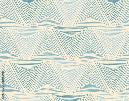 Seamless triangular blue and beige textured pattern with wobbly lines