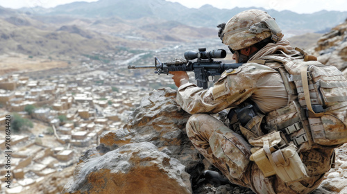 United States Army special forces soldier in the mountains with assault rifle in Yemen. photo