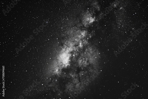 A stunning black and white photograph capturing the beauty of the Milky Way. Perfect for astronomy enthusiasts or those looking to add a touch of elegance to their design projects