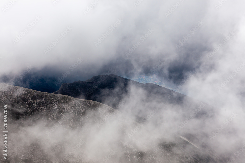 Cloudy view from mountain peak. Mount Vihren in Pirin National Park in Bulgaria.