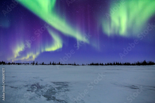 Aurora Borealis Over A Frozen Pond