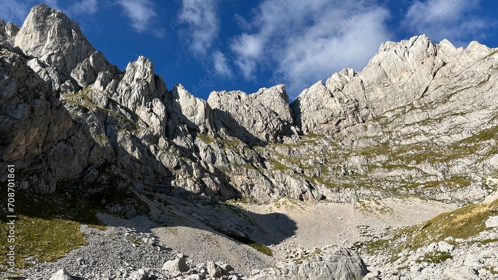 Panoramic view of the Dolomites mountain peaks. Massive sharp and high stone wall in the Alps in Europe