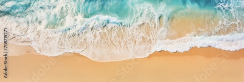Top view of the sea coast with rolling turquoise wave, sea travel and tourism, banner