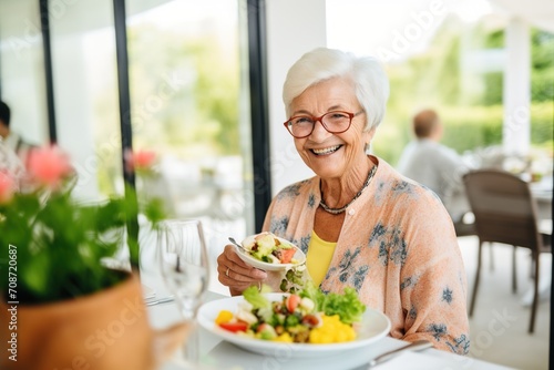 Portrait of a Smiling Senior Woman Enjoying a Healthy Salad