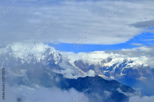 Majestic Veil: Annapurnas' Cloud-Kissed Giants © Gregorio Corral