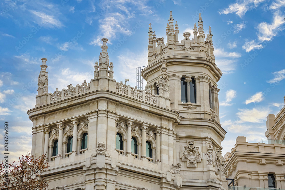 Architectural fragments of Cibeles Palace (Palacio de Cibeles) in Plaza de Cibeles: Madrid City Council (formerly Palace of Communication), iconic monument of the city. MADRID, SPAIN.