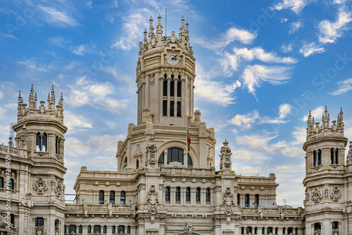 Architectural fragments of Cibeles Palace (Palacio de Cibeles) in Plaza de Cibeles: Madrid City Council (formerly Palace of Communication), iconic monument of the city. MADRID, SPAIN. photo