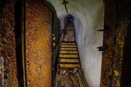 Old dark abandoned dirty Soviet bunker, echo of Cold War photo