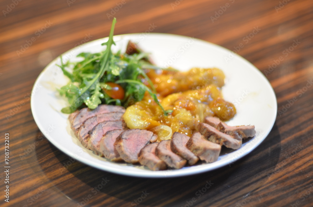 rosemary duck breast steak with vegetables and caramelized fruit rosemary duck breast steak with vegetables and caramelized fruit