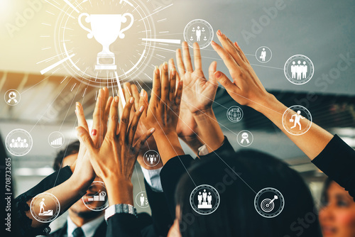 Obraz na plátně Achievement and Business Goal Success Concept - Creative business people with icon graphic interface showing employee reward giving for business success achievement