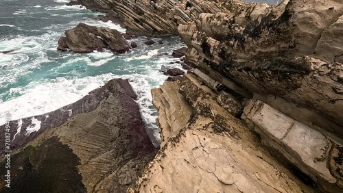 waves crashing on the rocky coast of the Atlantic ocean at Baleal, Ferrel, municipality of Peniche, district of Leiria, Portugal	 photo