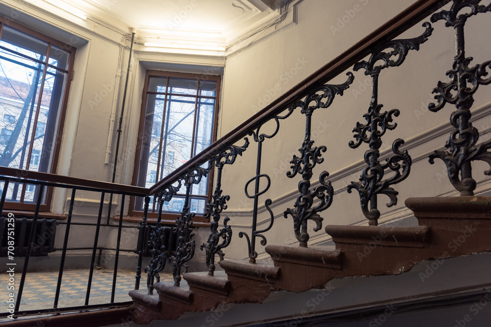 Obraz premium Beautiful view on a staircase of an old historic residential house in Saint-Petersburg, Russia