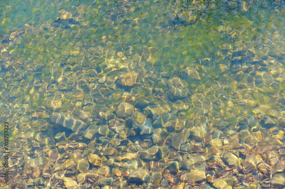 shinny pebbles in the water