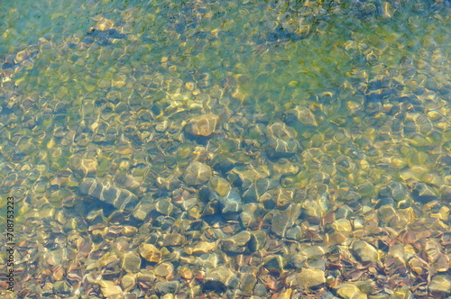 shinny pebbles in the water