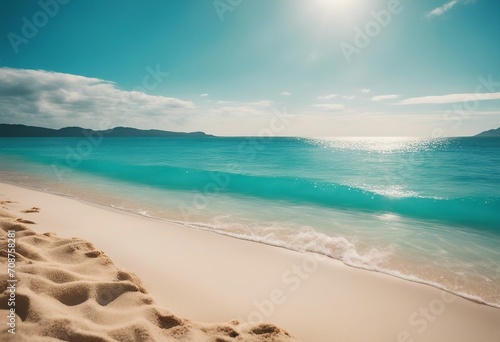 Abstract blur defocused background Tropical summer beach with golden sand turquoise ocean and blue s